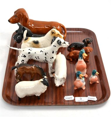Lot 3 - Six Beswick dogs, a Beswick pig, ram, foal and three ducks (on one tray)