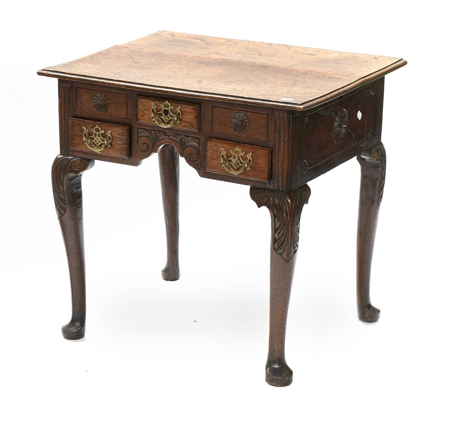 Lot 1329 - A George III Oak Lowboy, the moulded top above...