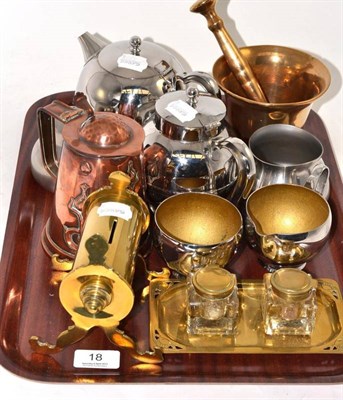 Lot 18 - A tray of decorative metalware including an Art Nouveau copper hot water jug, an Old Hall stainless