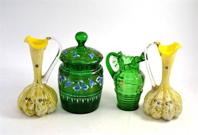 Lot 33 - Pair of yellow glass ewers, Victorian green biscuit jar and cover and a Victorian jug