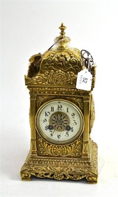 Lot 52 - A brass table clock with three keys and pendulum