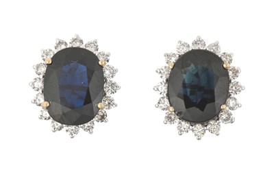 Lot 2069 - A Pair of Sapphire and Diamond Cluster...