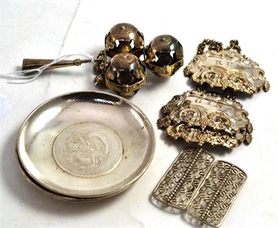 Lot 83 - Three Chinese export silver dishes mounted with coins, an unusual rattle/bell, three plated...