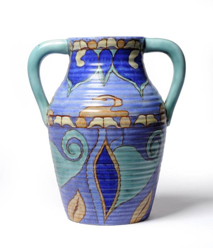Lot 929 - Inspiration Persian: A Clarice Cliff Bizarre Twin-Handled Lotus Jug, painted in shades of blue,...