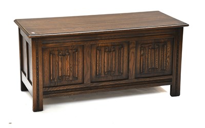 Lot 1354 - A Reproduction Oak Three Panel Linenfold...