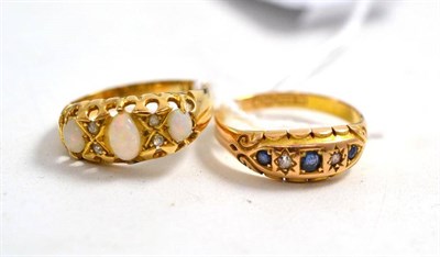 Lot 103 - A 15ct gold sapphire and diamond ring and an opal and diamond ring