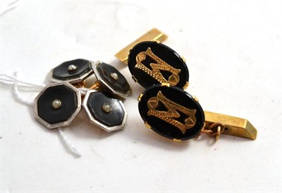 Lot 112 - A pair of 9ct gold cufflinks and a pair of seed pearl set cufflinks