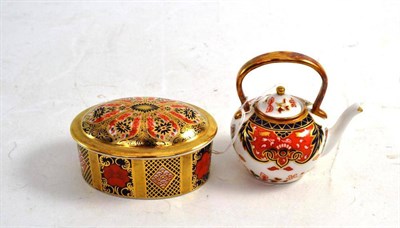 Lot 132 - A Royal Crown Derby miniature kettle, date code LIX and a Royal Crown Derby ";Old Imari 1128";...