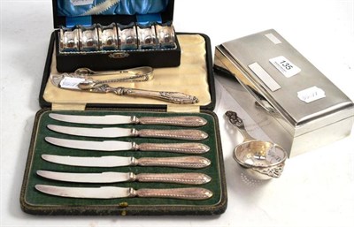 Lot 135 - A cased set of six silver handled tea knives, a pair of silver sugar tongs, a cased set of six...