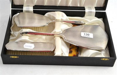 Lot 139 - A cased silver mounted brush set