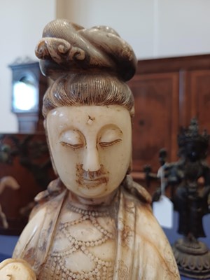 Lot 70 - A Chinese Soapstone Figure of Guanyin, Qing...