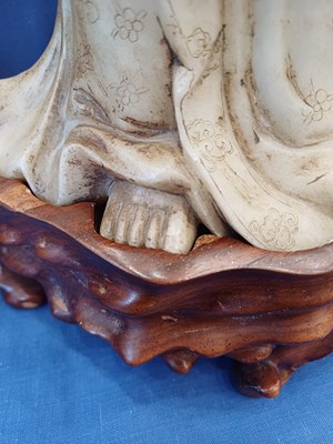 Lot 70 - A Chinese Soapstone Figure of Guanyin, Qing...