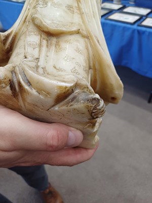 Lot 70 - A Chinese Soapstone Figure of Guanyin, Qing...