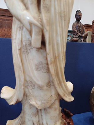 Lot 70 - A Chinese Soapstone Figure of Guanyin, Qing...