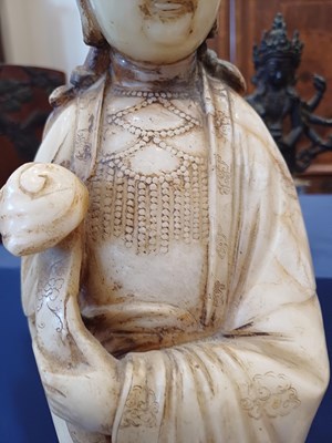 Lot 70 - A Chinese Soapstone Figure of Guanyin, Qing...