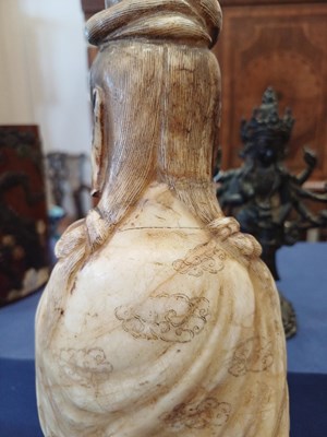 Lot 70 - A Chinese Soapstone Figure of Guanyin, Qing...