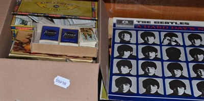 Lot 142 - A collection of cigarette cards and four Beatles albums