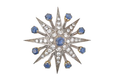 Lot 2067 - A Sapphire and Diamond Star Brooch the central...