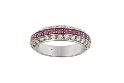 Lot 2326 - A Ruby and Diamond Half Hoop Ring a row of...