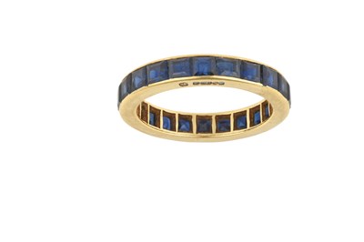 Lot 2430 - An 18 Carat Gold Sapphire Eternity Ring...