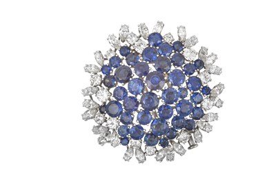 Lot 2080 - A Sapphire and Diamond Brooch the domed...