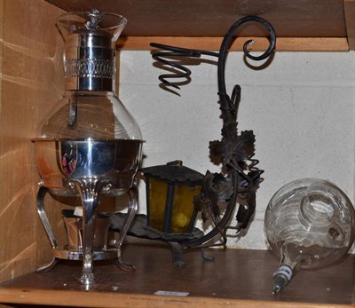 Lot 157 - Wrought iron wine cooler on trivet plate and glass ewer and burner