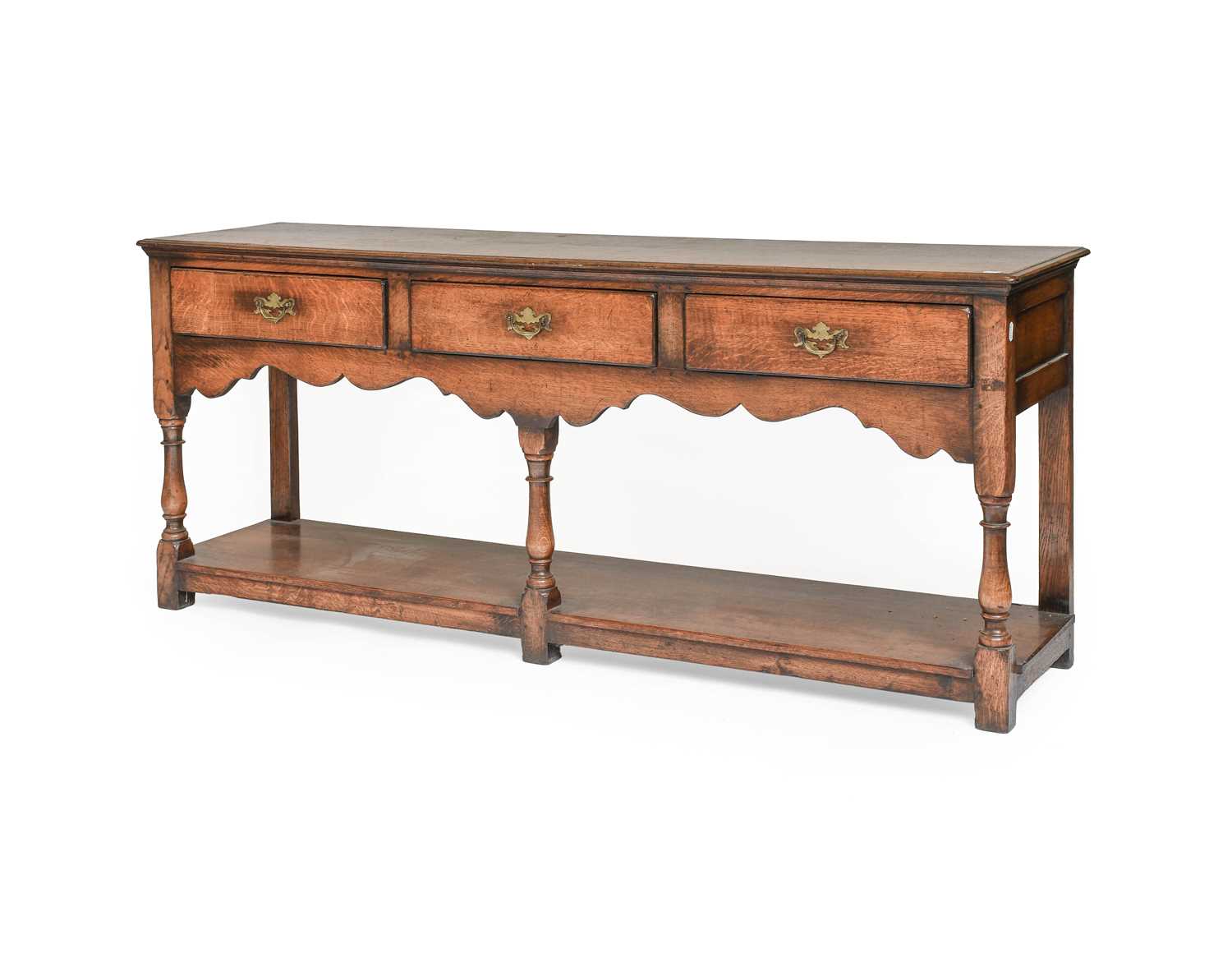 Lot 1167 - A Titchmarsh and Goodwin Style Three Drawer...