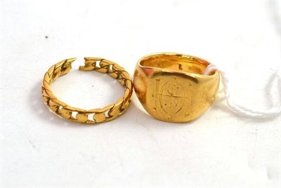 Lot 178 - A damaged 18ct gold bang ring and a signet ring