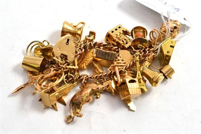 Lot 185 - A 9ct gold charm bracelet