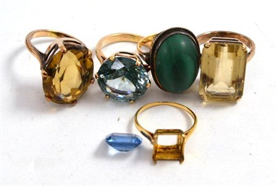 Lot 186 - A synthetic spinel ring, a malachite ring stamped '9ct', two citrine rings and a blue stone...