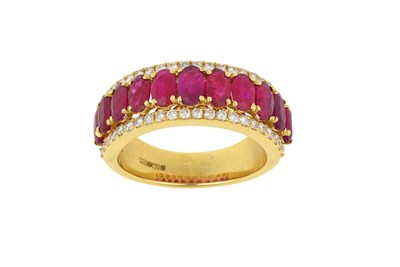 Lot 2043 - An 18 Carat Gold Ruby and Diamond Ring eleven...