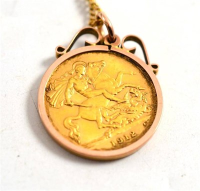 Lot 197 - A 1912 half sovereign loose mounted as a pendant, on a curb link chain with applied plaque '9c'