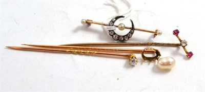 Lot 204 - A diamond stick pin, two others and a crescent brooch (4)