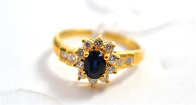 Lot 210 - A sapphire and diamond ring