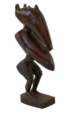 Lot 394 - A Senufo Carved Wood Figure of a Woman, Ivory...