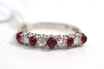 Lot 232 - A diamond and ruby ring