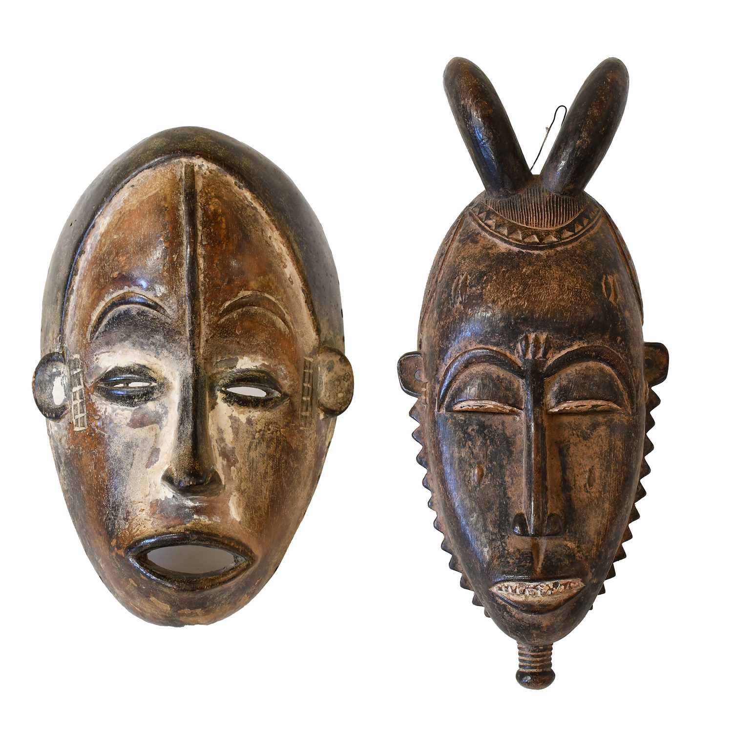 Lot 402 - An Igbo Carved Wood Face Mask, Nigeria, the...