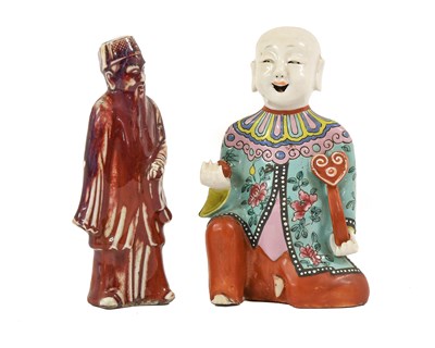 Lot 40 - A Chinese Porcelain Figure of a Boy, 19th...