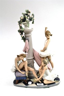 Lot 242 - A Lladro group of three ballet dancers