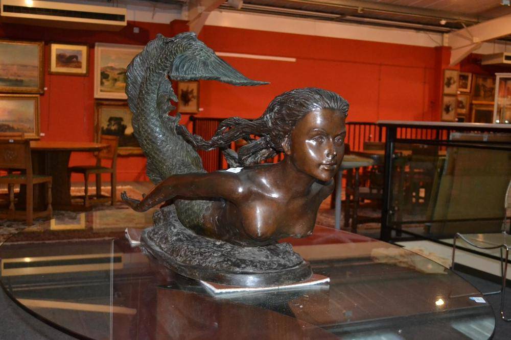 Lot 945 - A Modern Bronze Sculpture, modelled as a mermaid swimming, unsigned, 106cm long