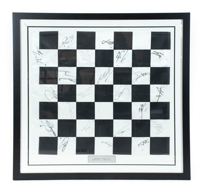 Lot 780 - A Framed Black and White Silk Flag, signed by...