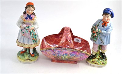 Lot 254 - A pair of Staffordshire figures and lustre basket