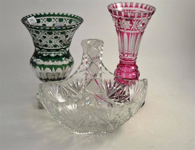 Lot 258 - Two Bohemian tinted and cut glass vases and a cut glass basket (3)