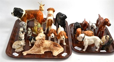 Lot 273 - Eight Royal Doulton dogs, Beswick animals etc (on two trays)