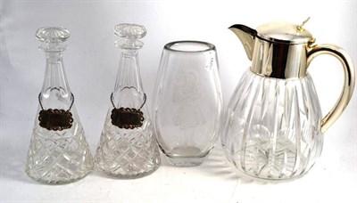 Lot 276 - A large silver plated and cut glass lemonade jug, two decanters with silver labels and a...