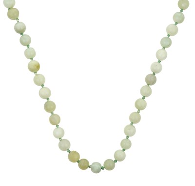 Lot 2356 - A Jade Bead Necklace comprised of one hundred...