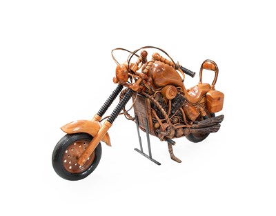 Lot 744 - A Carved Wooden Model of a Harley...