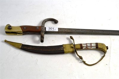 Lot 301 - A French Gras bayonet - lacks scabbard and an Indian dagger with scabbard (2)