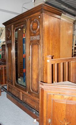 Lot 1260 - A 1920s/ 30s Oak Two Piece Bedroom Suite,...