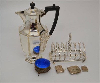 Lot 335 - Plated jug, toast rack, enamel box, two silver vestas and a stamp case